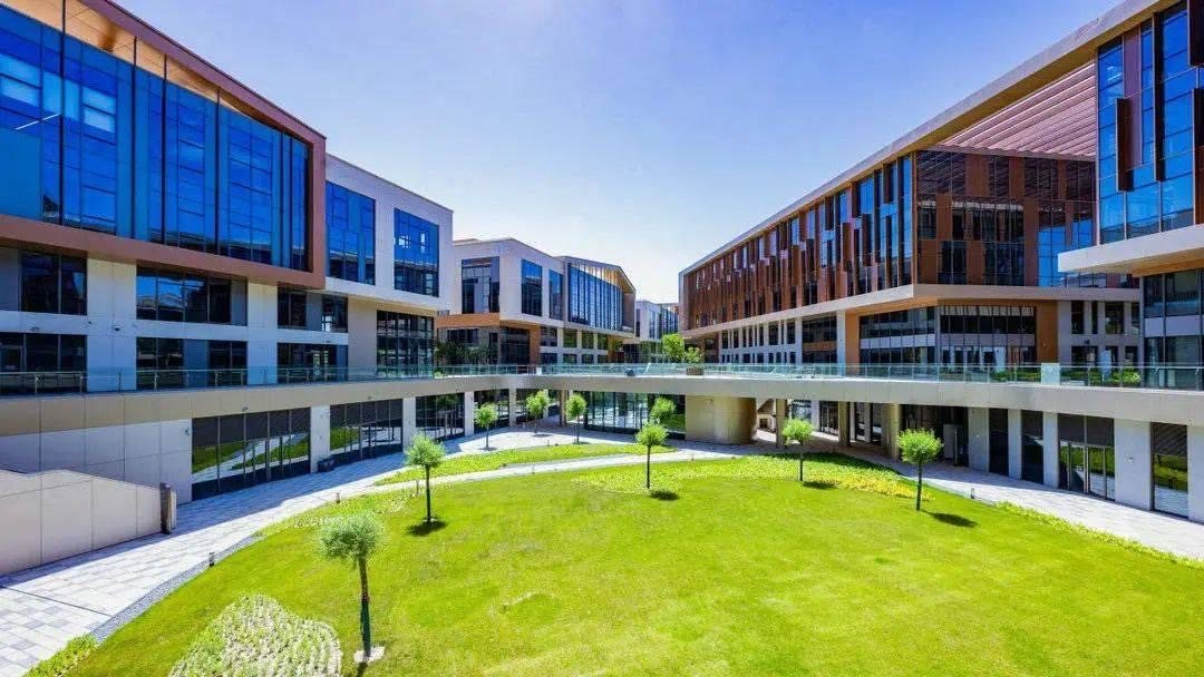 Student housing community - multi-story blocks around a shared central lawn