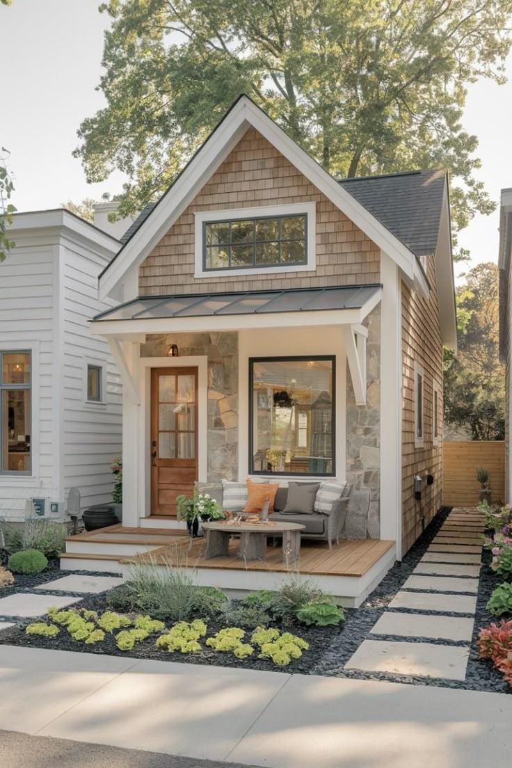 400 sq ft one-bedroom cottage with a covered front porch